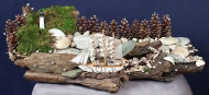 Driftwood art of oceanfront view with lighthouse
