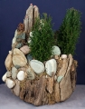 Driftwood sculpture of mountain scene